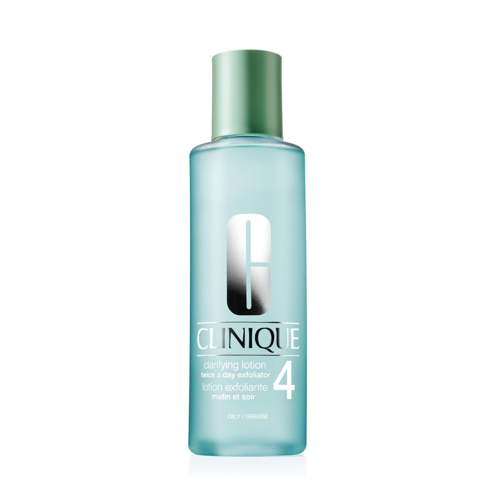 Clinique Clarifying Lotion 4 bottle pour demonstrates oil-control benefits for oily skin.