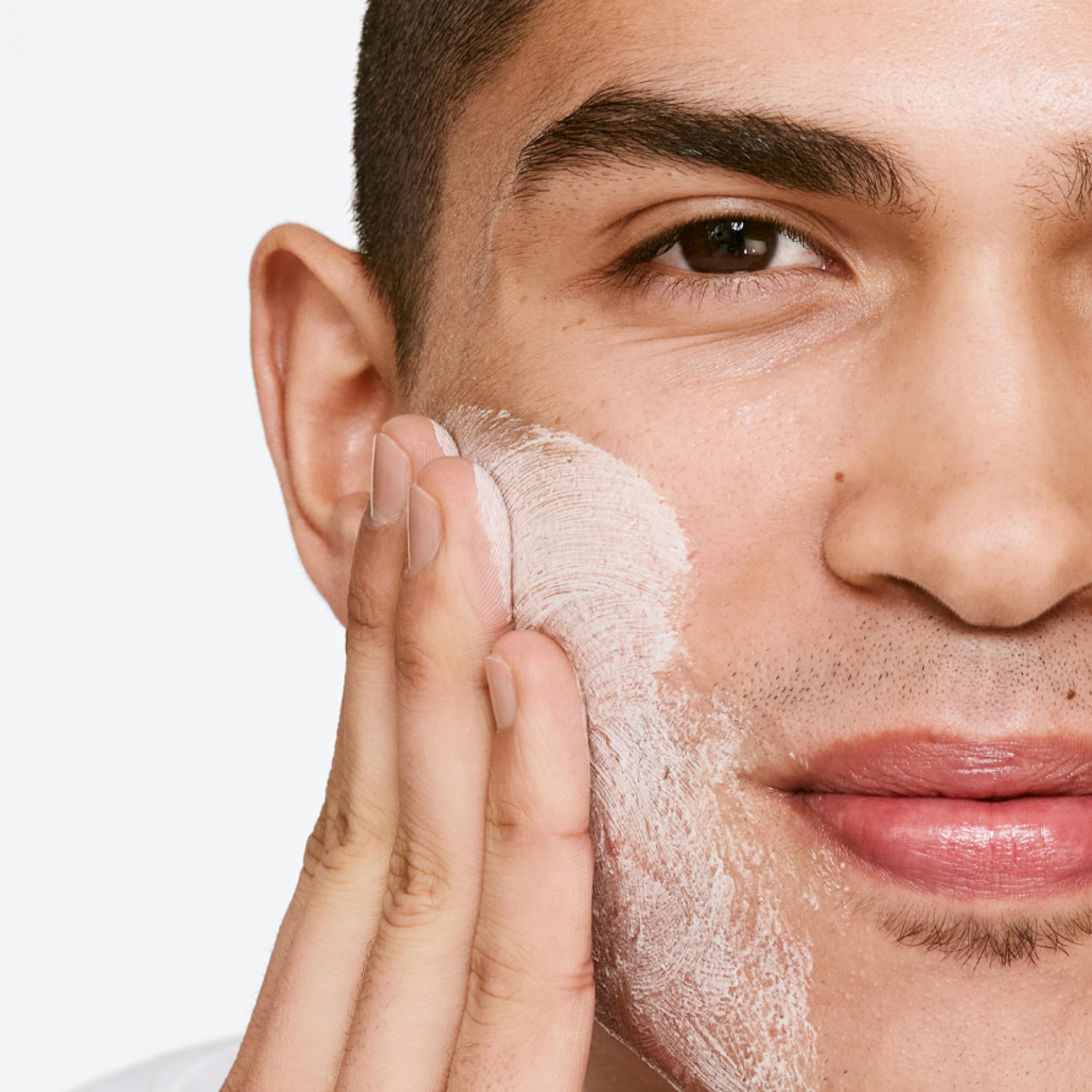 Charcoal close-up showing detoxifying formula in Clinique For Men wash.