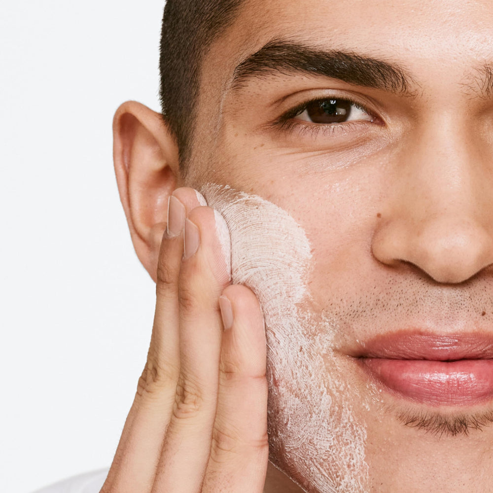 Charcoal close-up showing detoxifying formula in Clinique For Men wash.