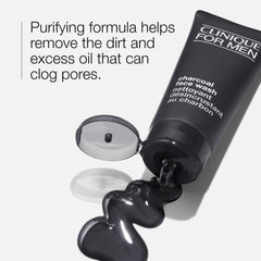 Charcoal Face Wash foam in hand from Clinique For Men cleanses pores gently.