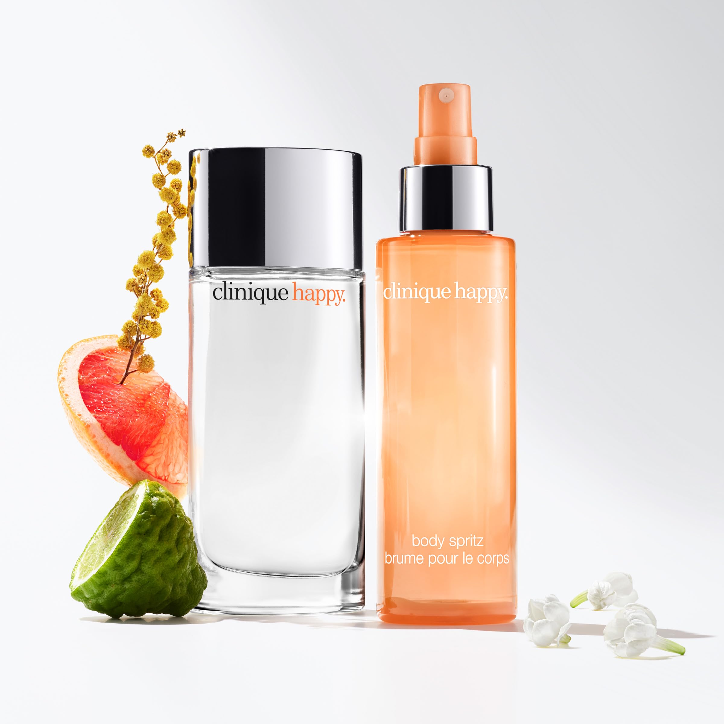 Clinique Happy Body Spritz spray in motion showing easy, quick application.