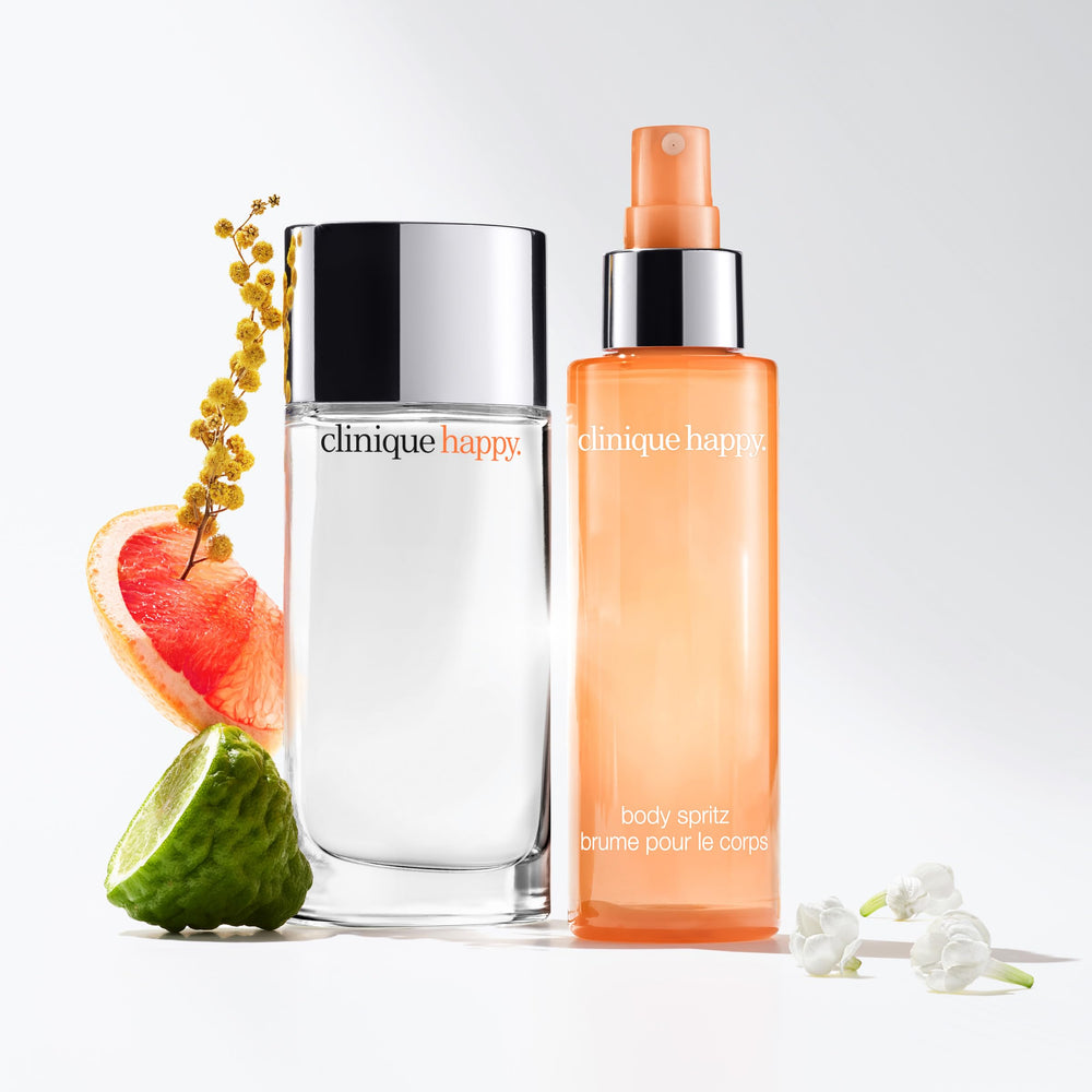 Clinique Happy Body Spritz spray in motion showing easy, quick application.