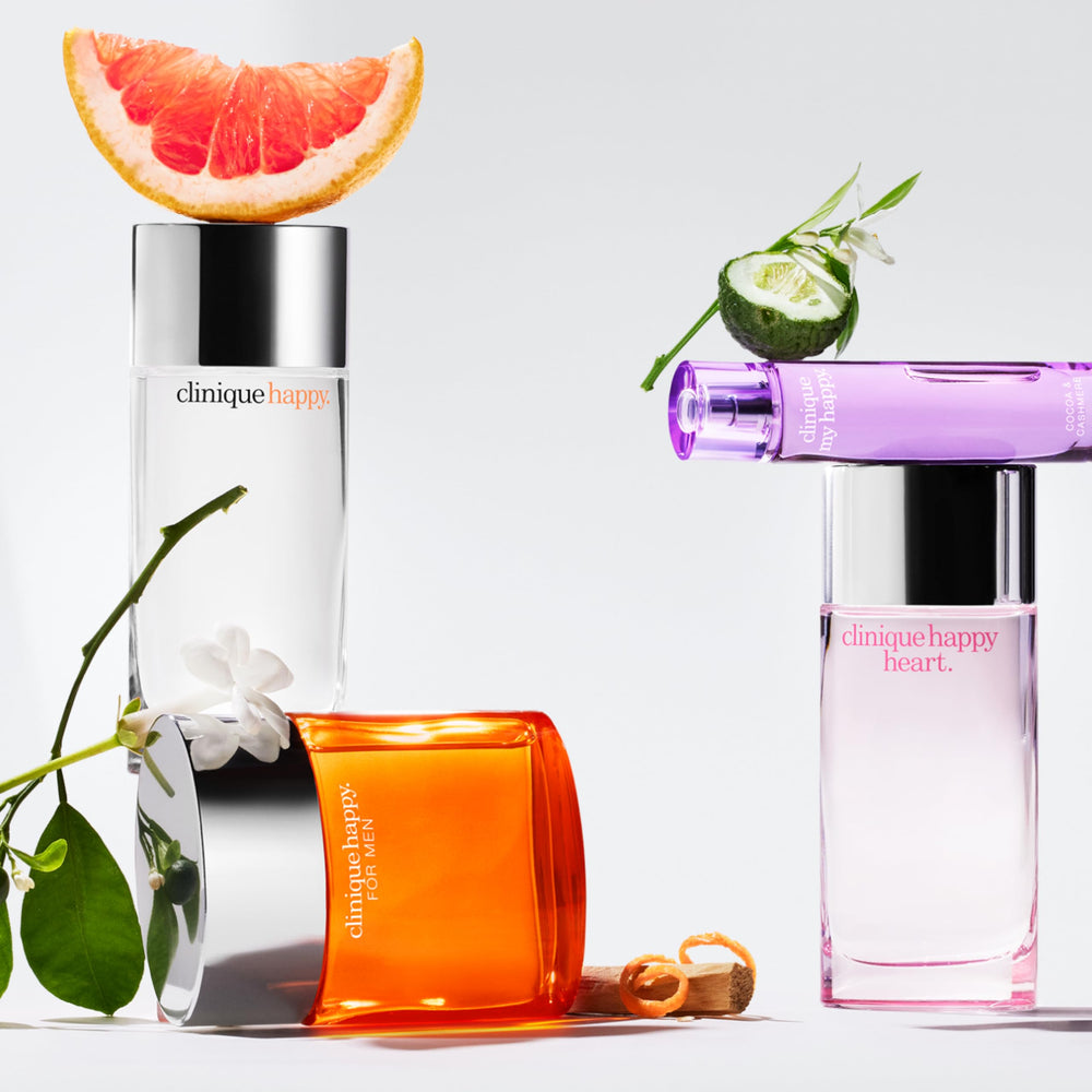 Close-up of Clinique Happy bottle highlighting elegant citrus-floral balance