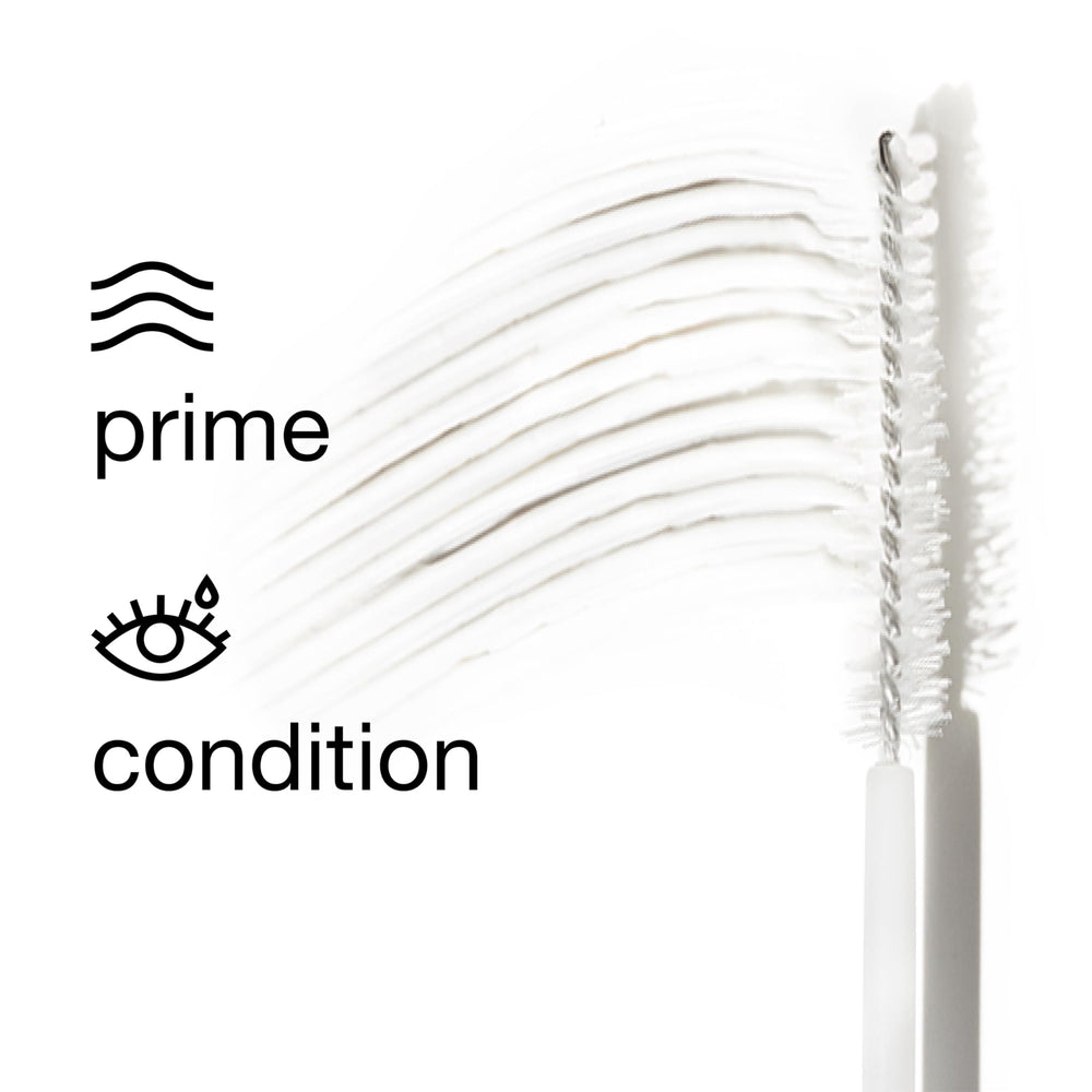 Applying Clinique Lash Building Primer on lashes before mascara