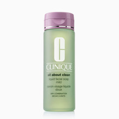 Clinique Liquid Facial Soap bottle with gentle pour showing mild cleansing for Step 1.