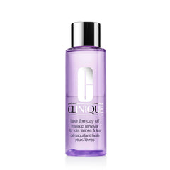 Clinique Take The Day Off bottle close-up highlights oil-free makeup remover for sensitive eyes