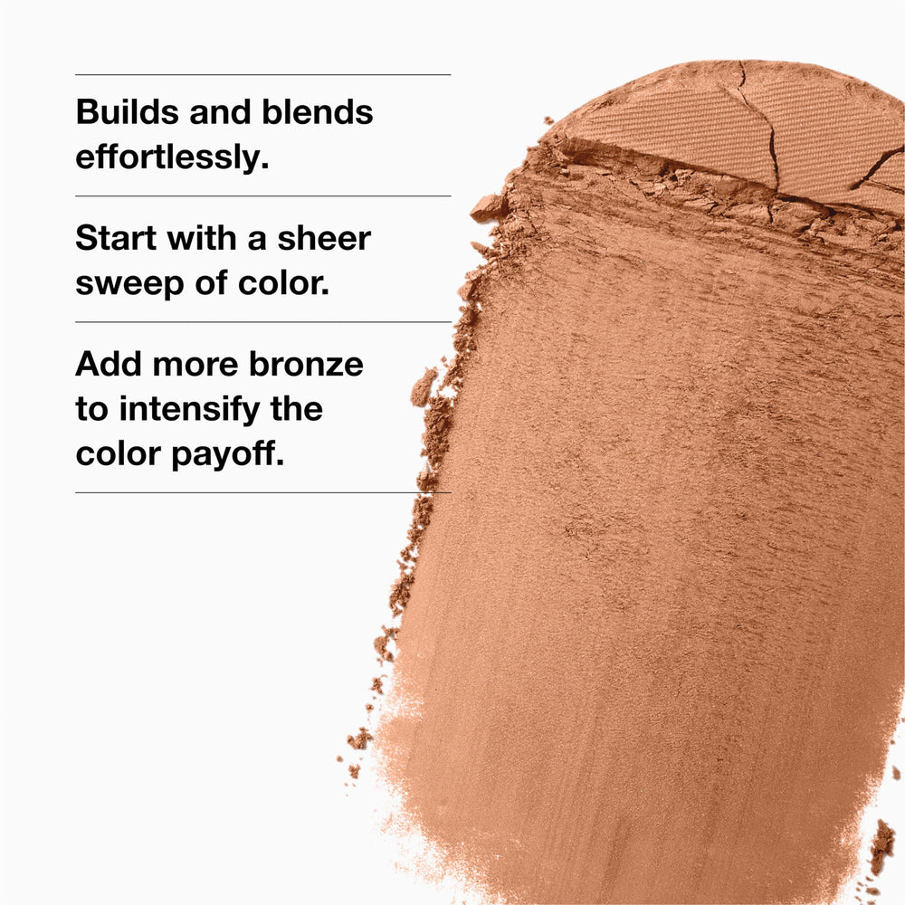 Applying Clinique True Bronze on cheeks for sun-kissed warmth