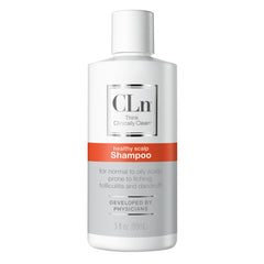 CLn Shampoo con ácido salicílico derramando la botella para limpieza profunda