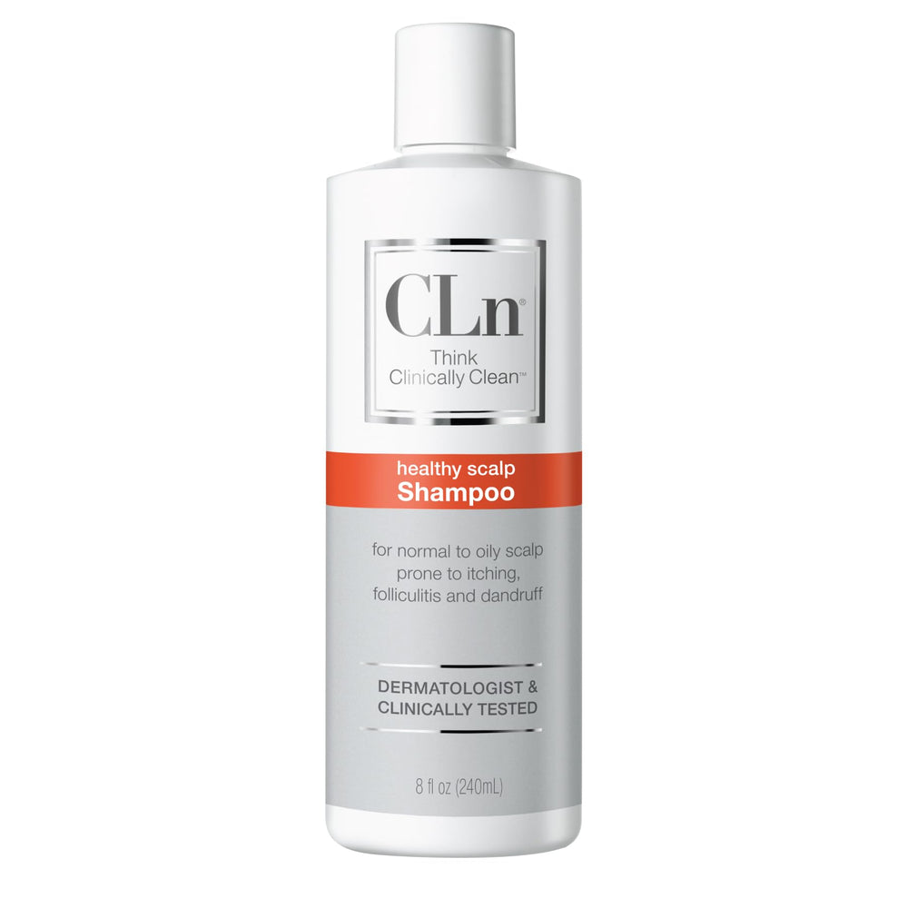 CLn Shampoo bottle pour shows easy application for a clarifying cleanse on an oil-prone scalp.