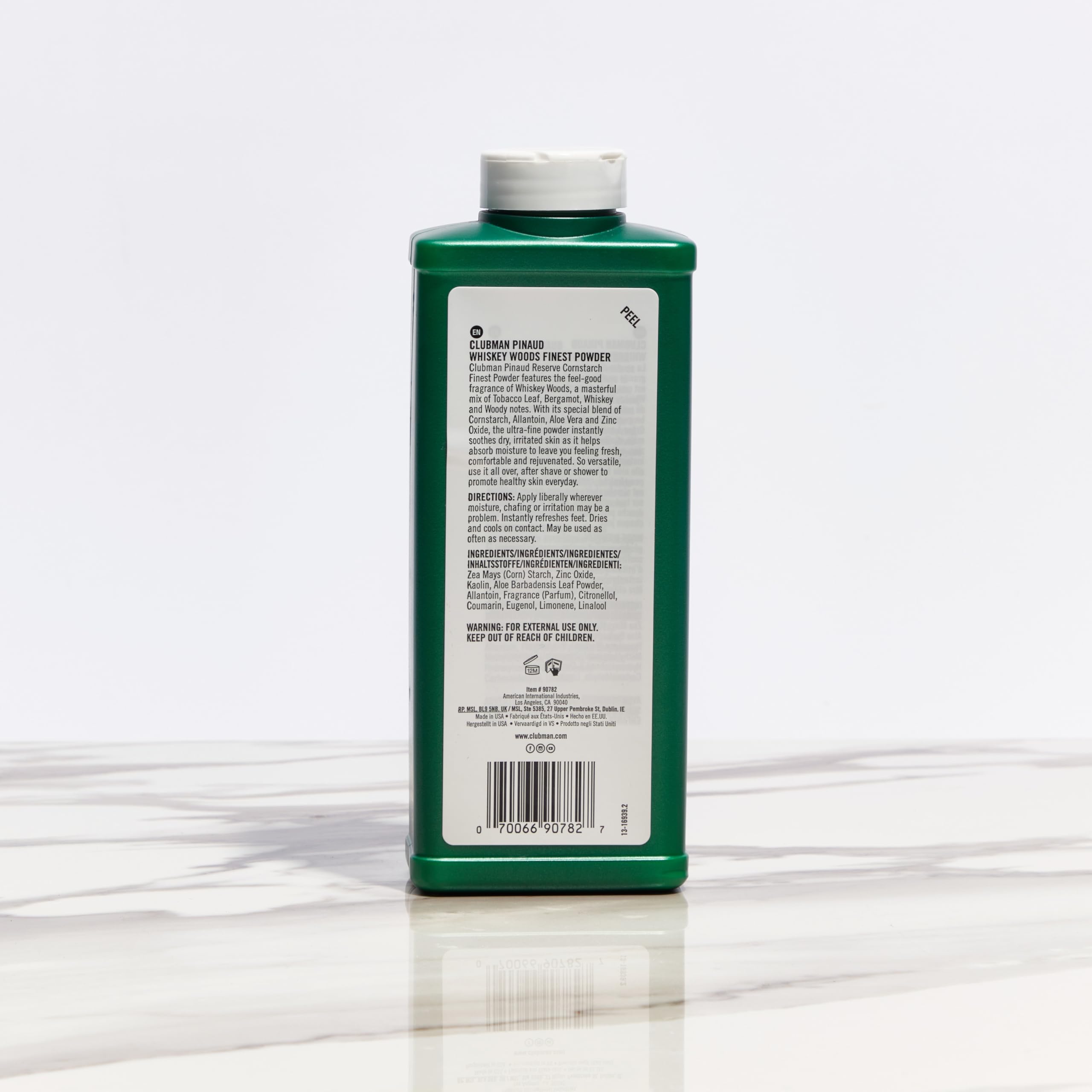 Clubman Reserve Whiskey Woods packaging highlights corn starch and aloe.