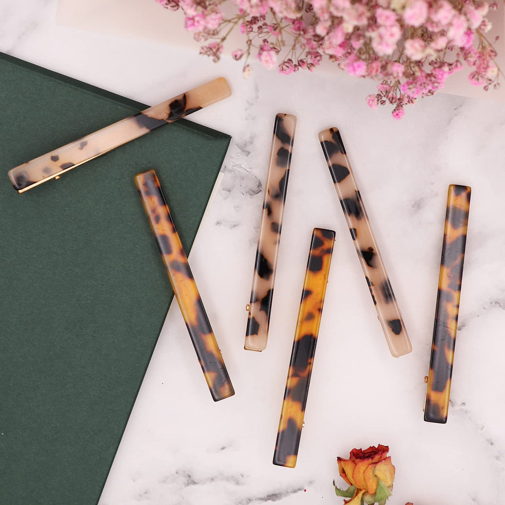 Cobahom tortoise-shell duckbill clip keeps hair neat during busy days.