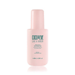 Coco & Eve Like A Virgin Frizz Fix bottle pour for controlled, frizz-free application.