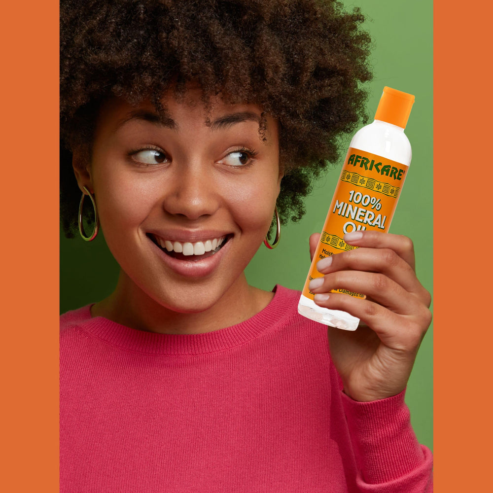 COCOCARE Africare mineral oil for versatile head-to-toe moisture