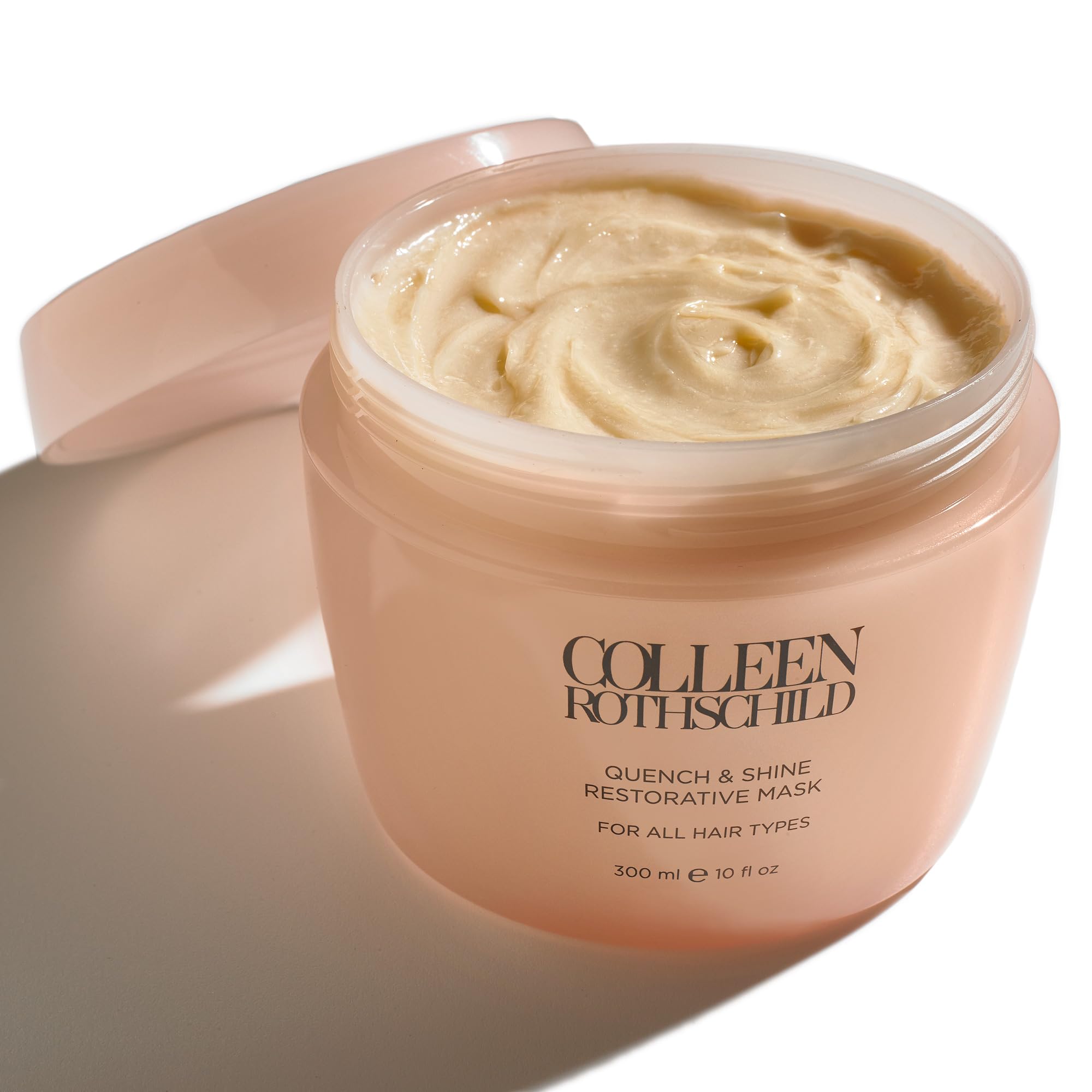 COLLEEN ROTHSCHILD Quench and Shine mask bottle promotes deep conditioning.