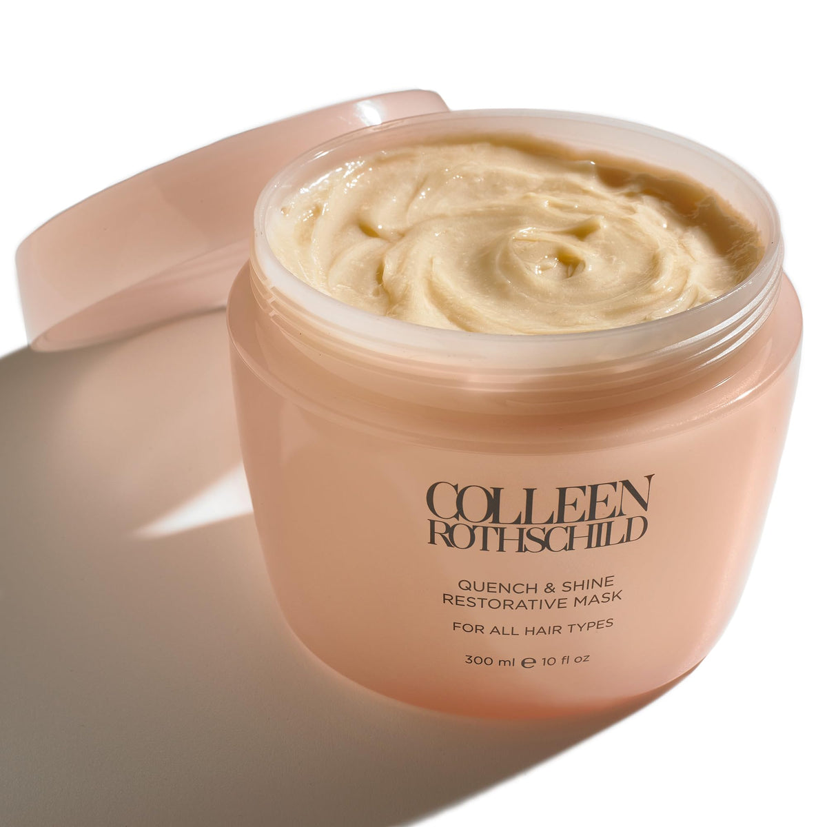 COLLEEN ROTHSCHILD Quench and Shine mask bottle promotes deep conditioning.