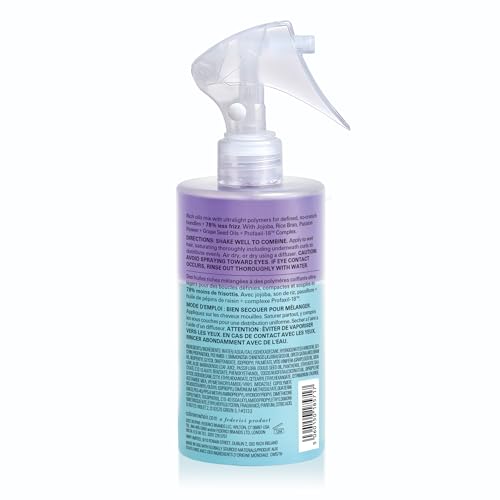 COLOR WOW Curl Wow Shook bottle pouring two-part formula for hydration.
