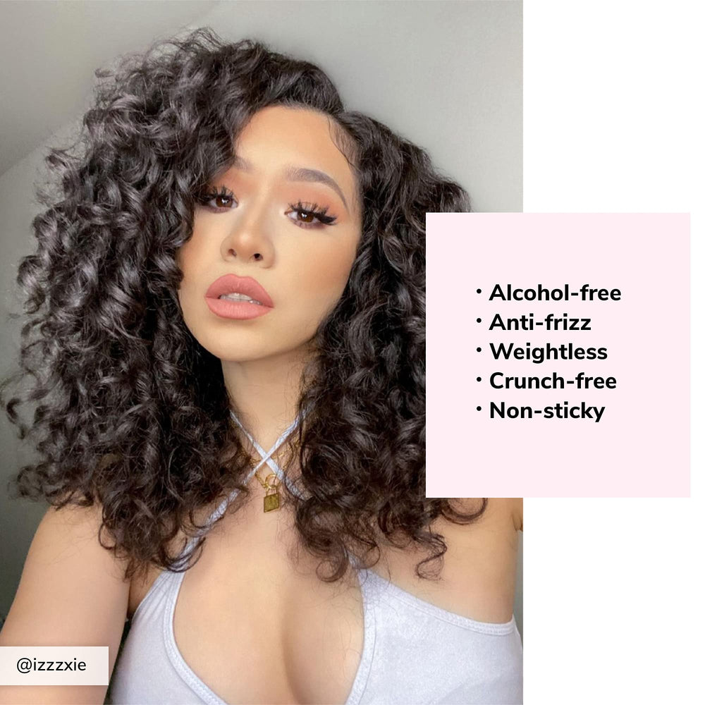 Dream Coat spray evenly coats curl strands for frizz control.