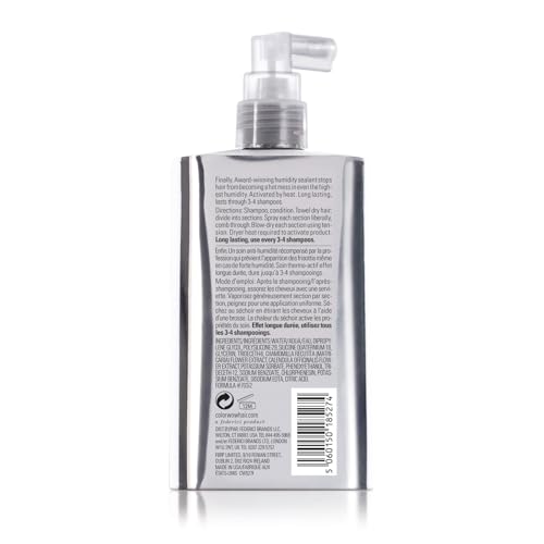Dream Coat being sprayed on damp hair for even coverage