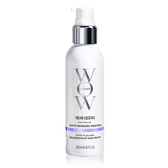 COLOR WOW Dream Cocktail bottle on a vanity, suggesting instant thickening for fine color-treated hair