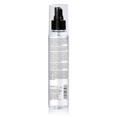 Color WOW Speed Dry spray dispensing evenly on hair for quick styling