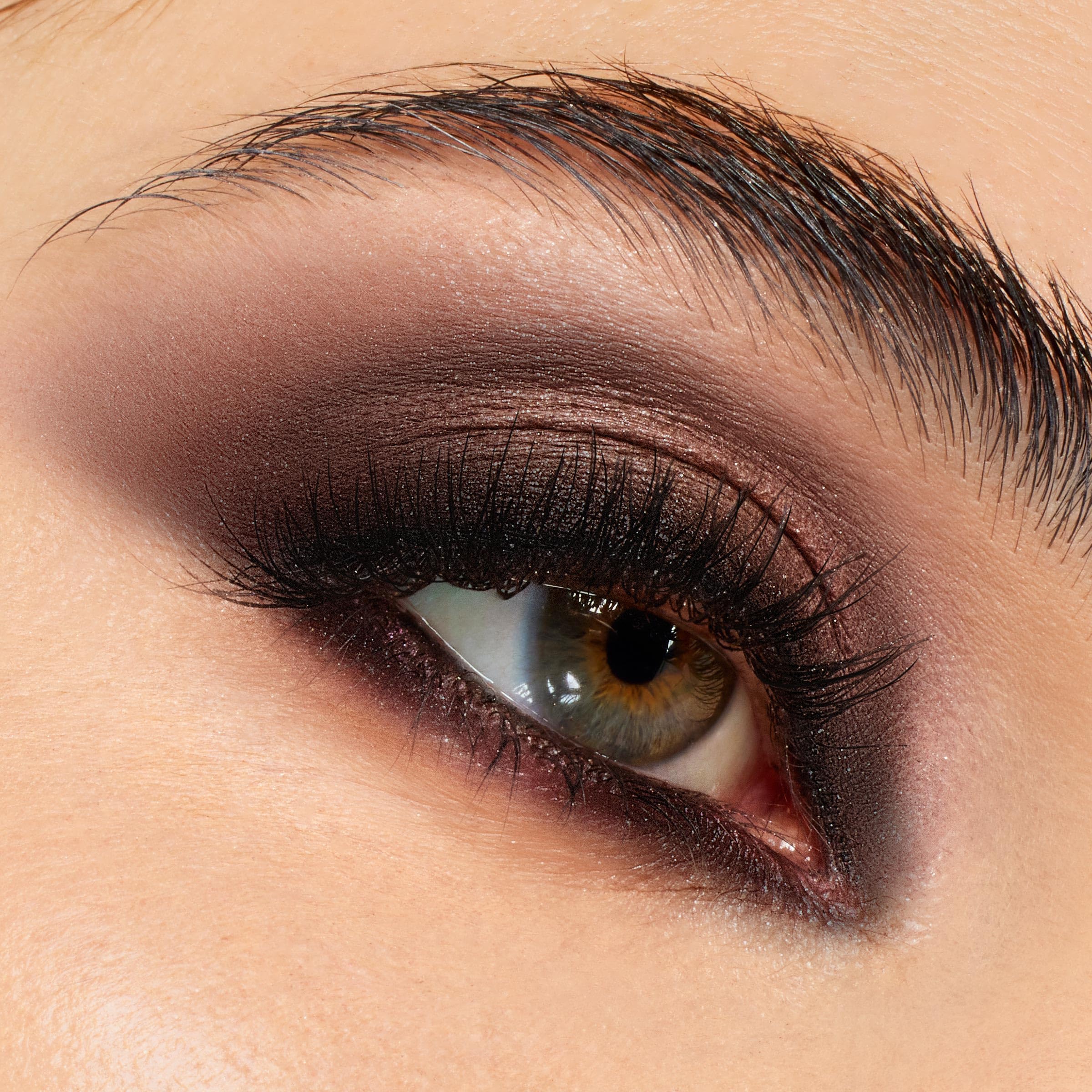ColourPop After Hours matte swatch on arm showcases smooth blendability.