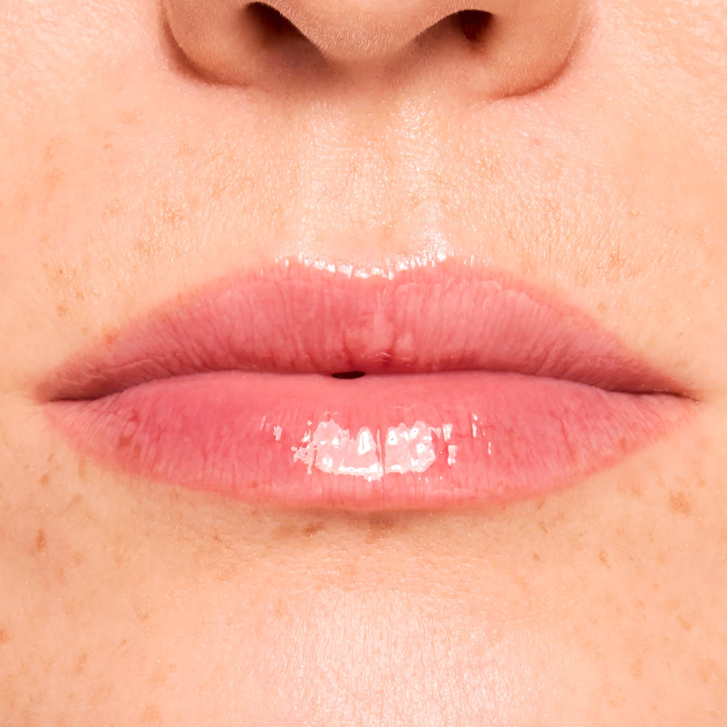 ColourPop Fresh Kiss glossy finish on lips with ultra-sheen.