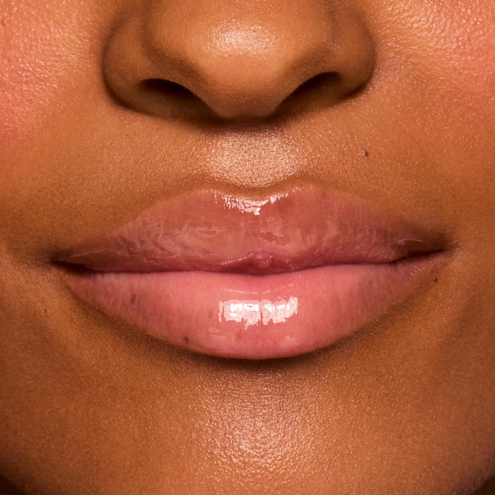 ColourPop Fresh Kiss Vanilla Cake scent with sheer color on lips.