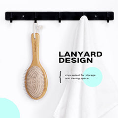 Combetter bamboo brush with lanyard indicates space-saving bathroom storage