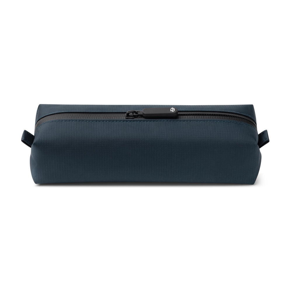 Comfyable small toiletry bag for men in blue, keeps essentials organized on trips.