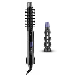 Conair 2-in-1 hot air styling curl brush on vanity for effortless home blowouts.