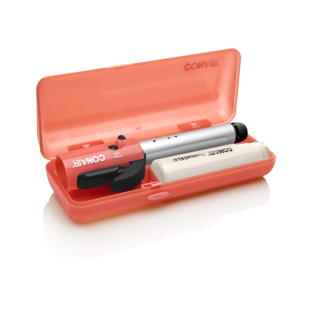 Conair curling iron in hands demonstrates travel-friendly design for quick touch-ups.