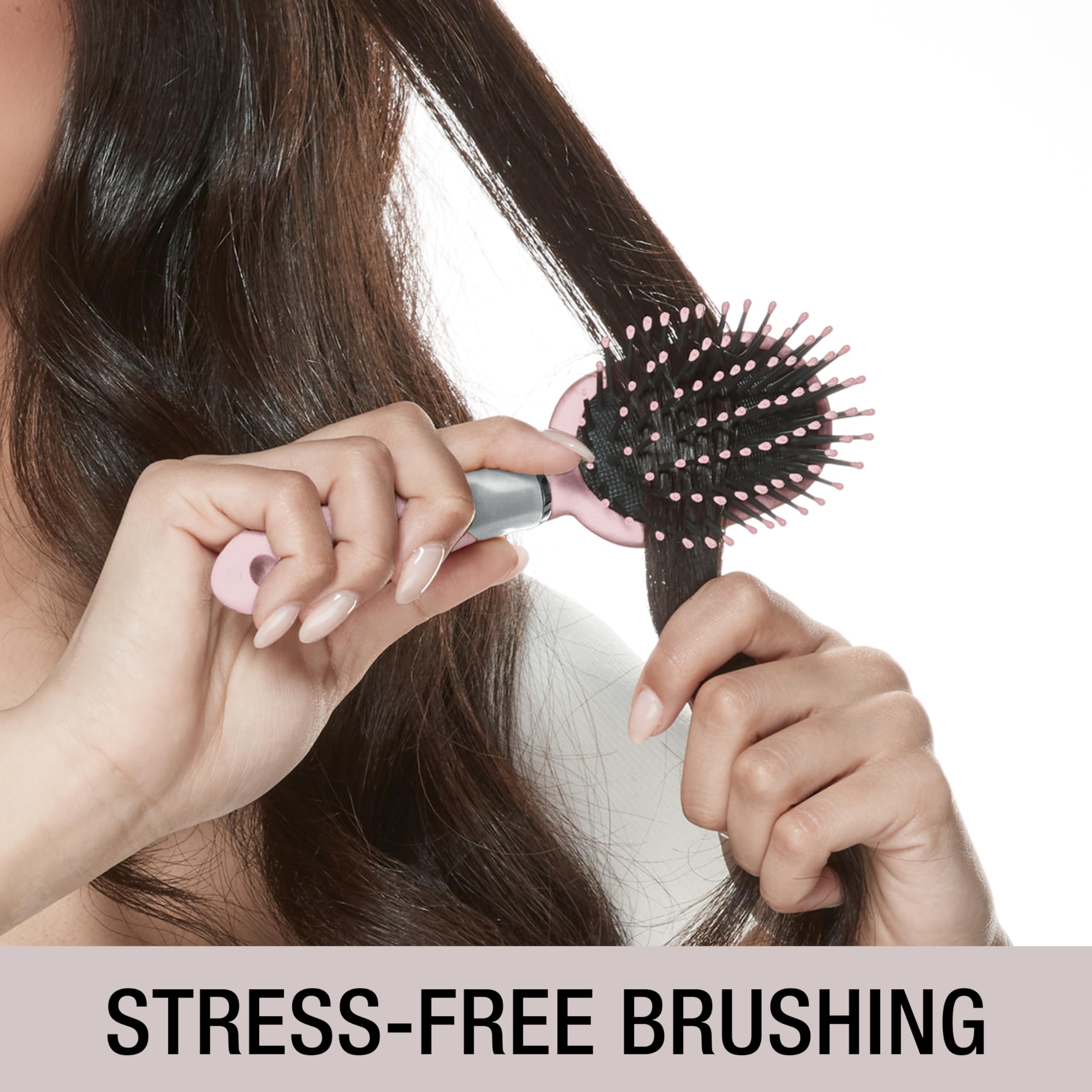 Conair Velvet Touch Brush in use, perfect for quick detangling at home or while traveling.
