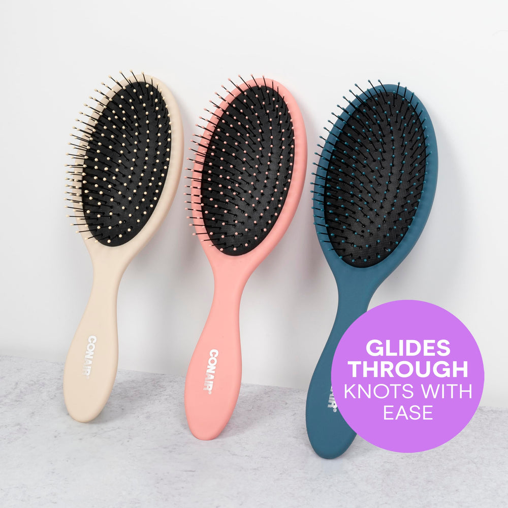 Three-pack Detangler brushes from Conair ready for quick styling touch-ups.