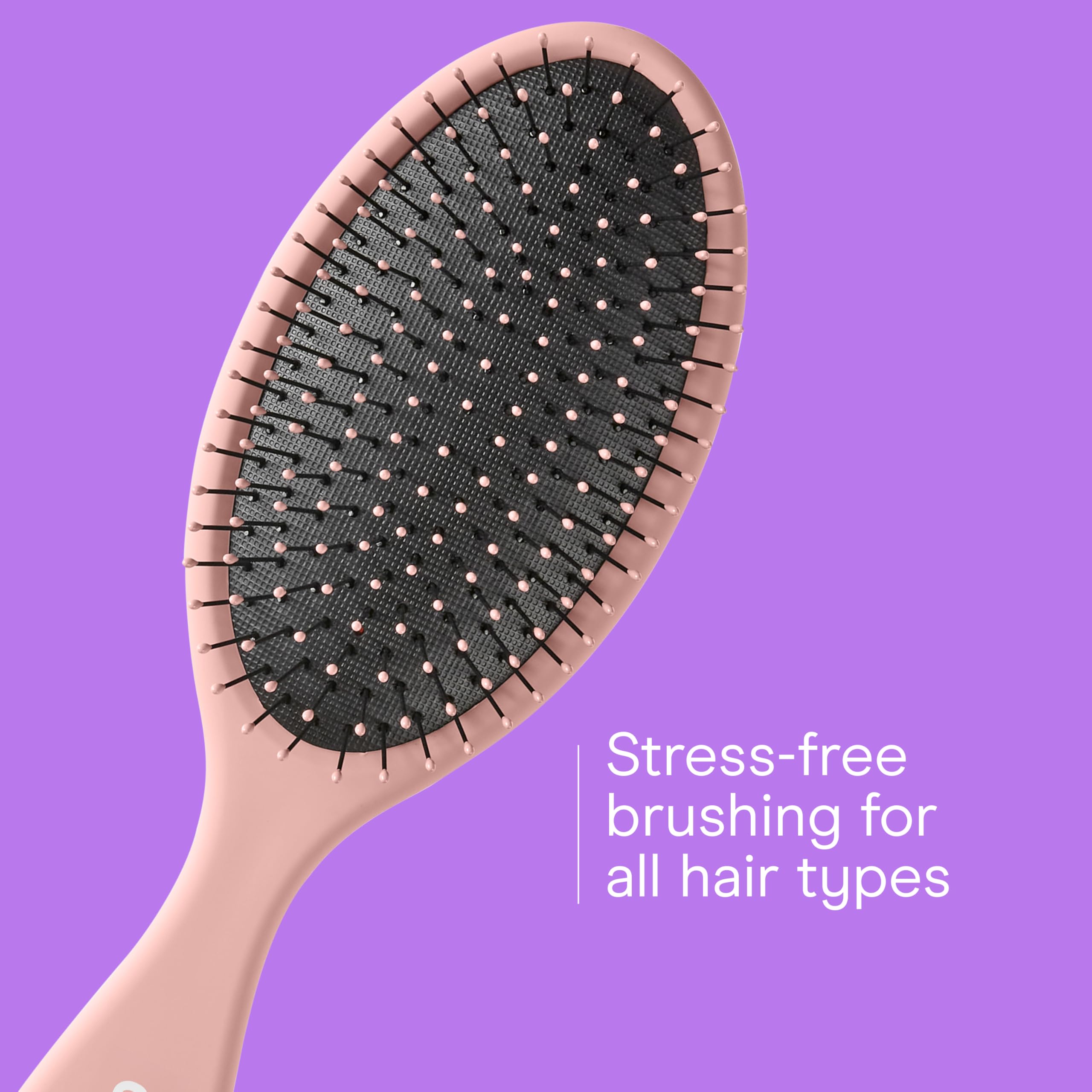 Conair Detangling Brush with cushioned base for comfortable brushing.