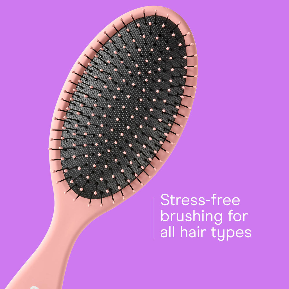 Conair Detangling Brush with cushioned base for comfortable brushing.