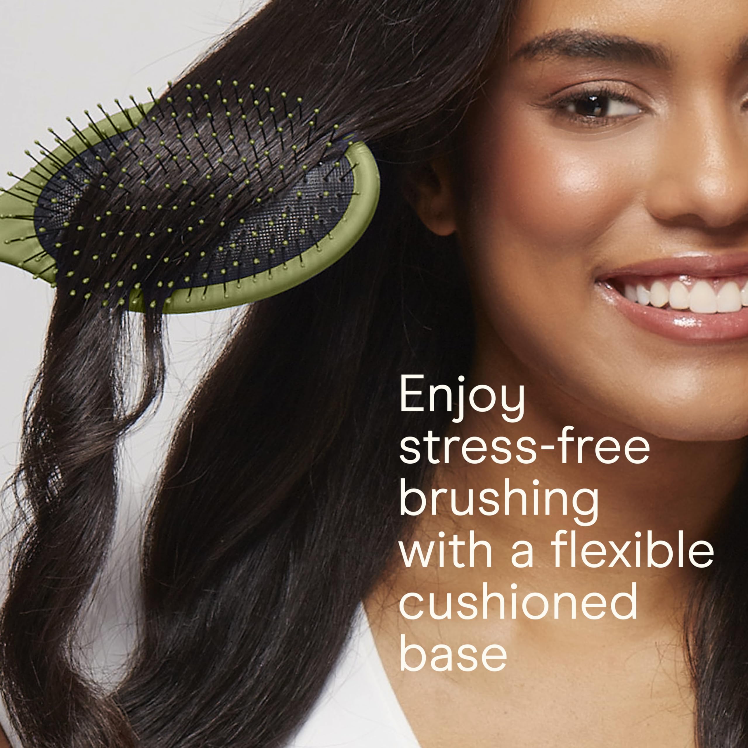 Conair Detangling Brush Set on dry hair smooths knots gently.