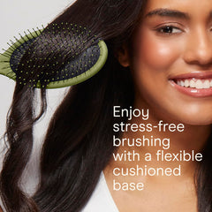Conair Detangling Brush Set on dry hair smooths knots gently.