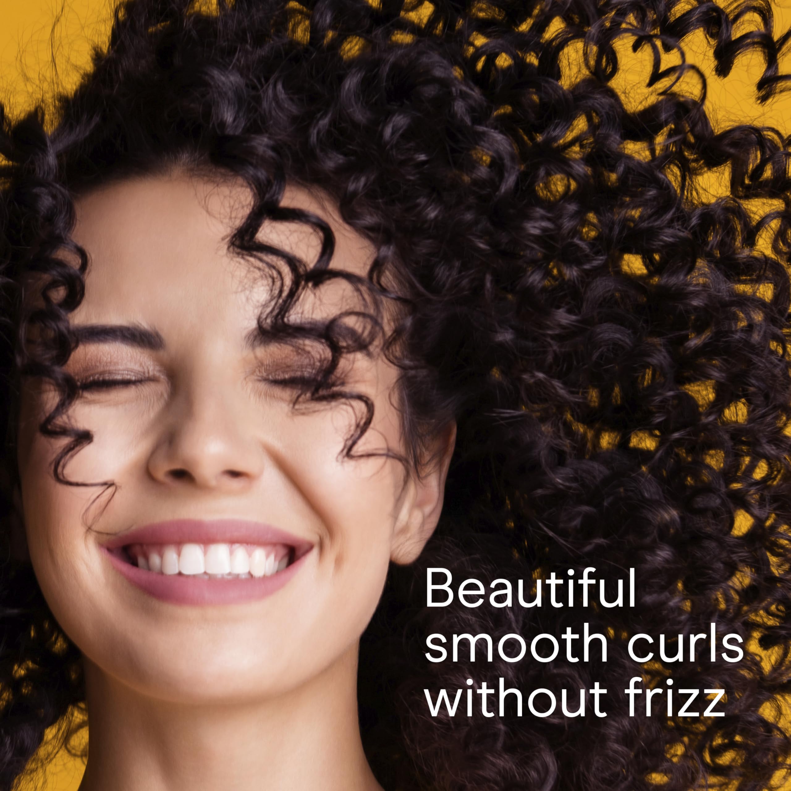 Conair curling iron showing dual voltage, ideal for travel styling.
