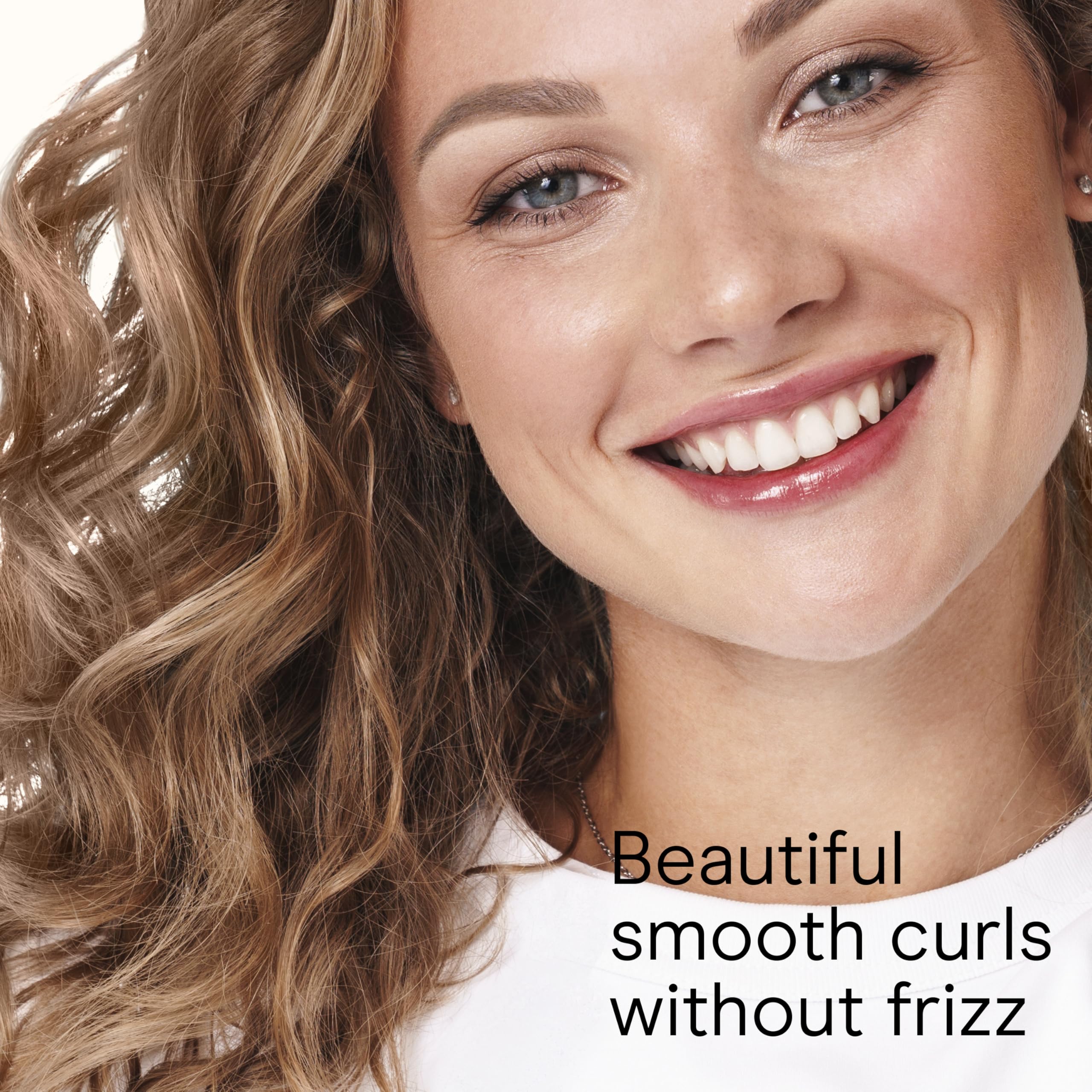 Conair Double Ceramic 1-Inch Curling Iron is dual voltage for travel styling.