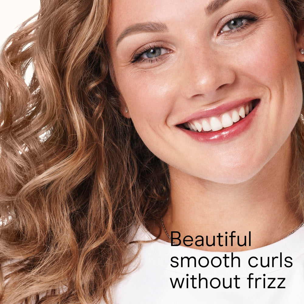 Conair Double Ceramic 1-Inch Curling Iron is dual voltage for travel styling.