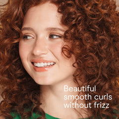 Conair curling iron cool-tip close-up emphasizes safe handling and precise curling.