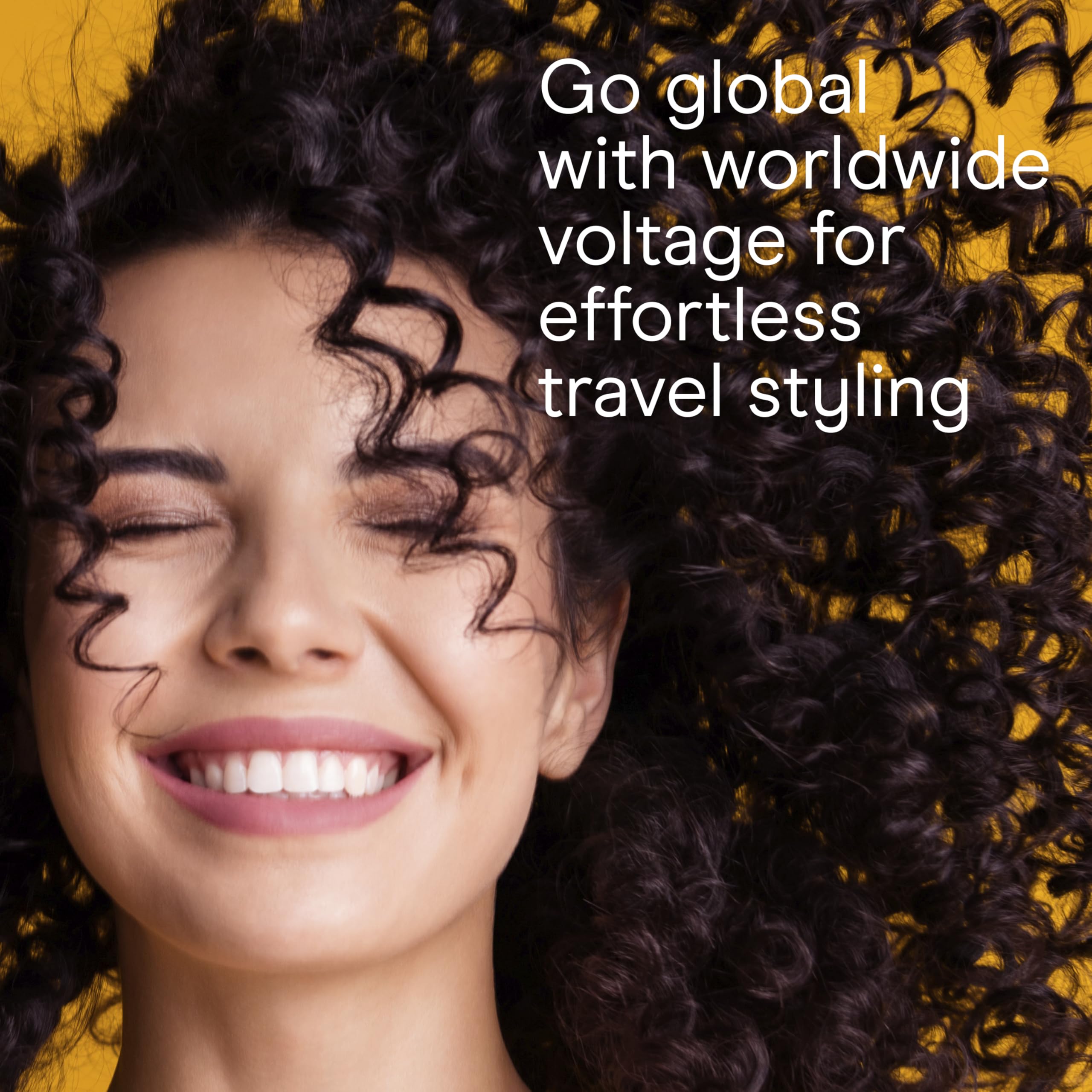 Conair ¾-inch curling iron in-use on short hair creating tight curls.