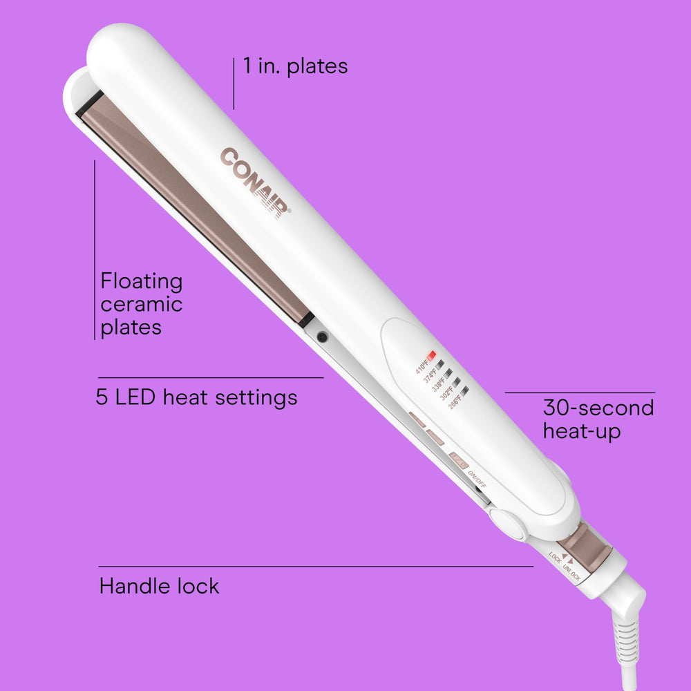 Conair flat iron with claw clip for easy hair sectioning during styling.