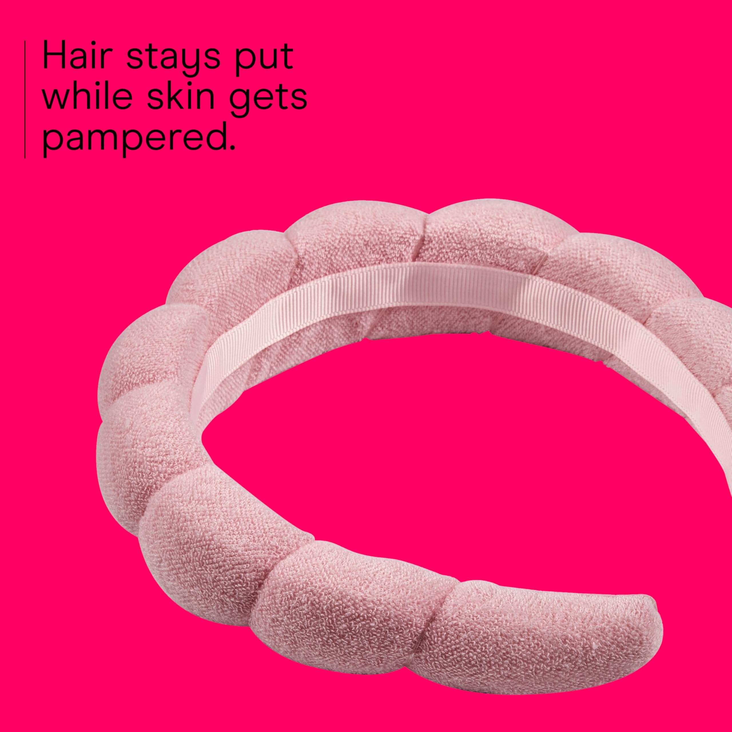 Conair headband with no-squeeze, no-pull design protects hair while applying makeup.