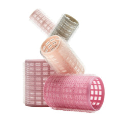Conair heatless curls rollers in pink storage case for travel-friendly styling.