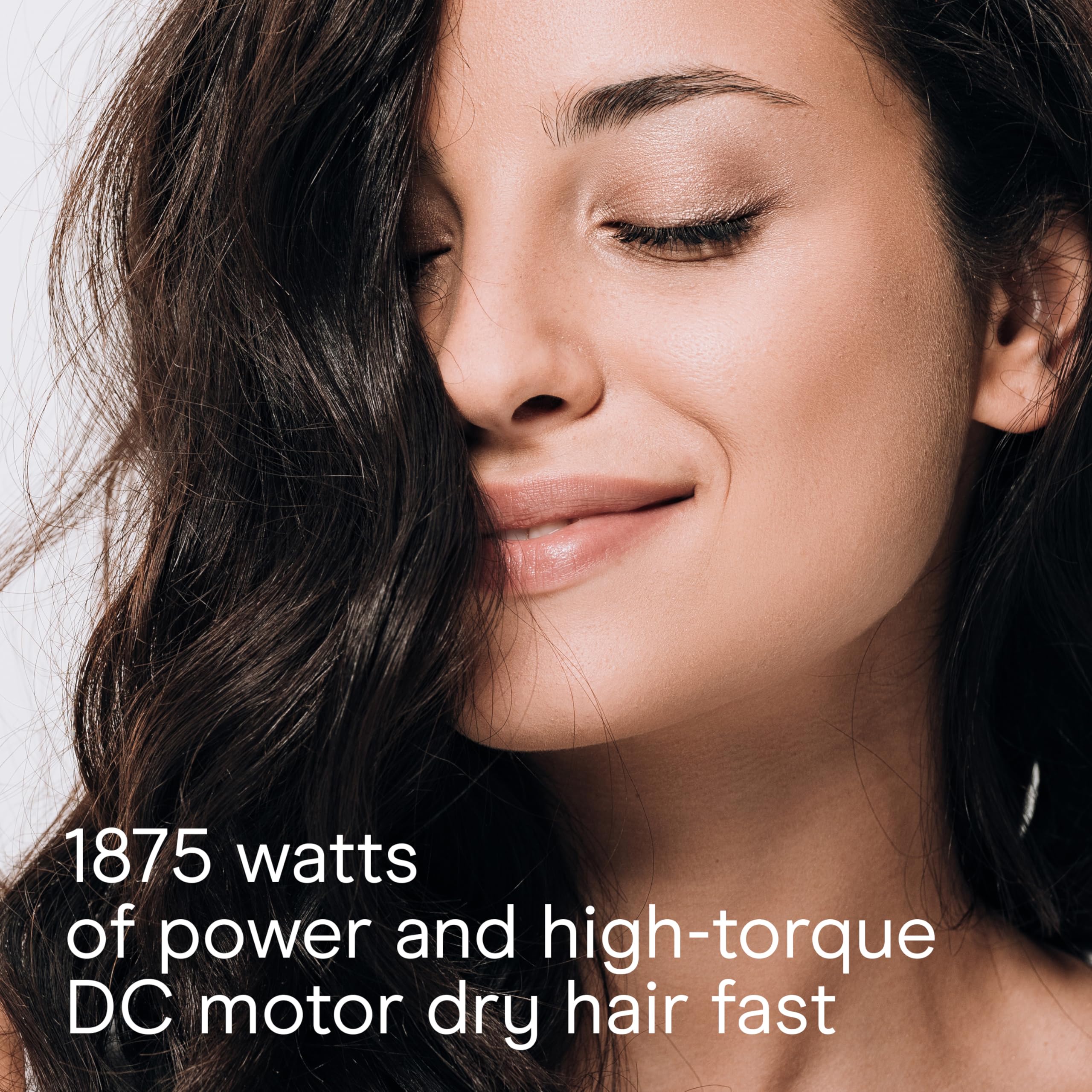 Conair Infiniti Pro Style & Shine dryer cool-shot button locks a finished look.