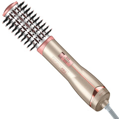 Conair INFINITIPRO Frizz Free hot air brush in action for smooth, voluminous styling.