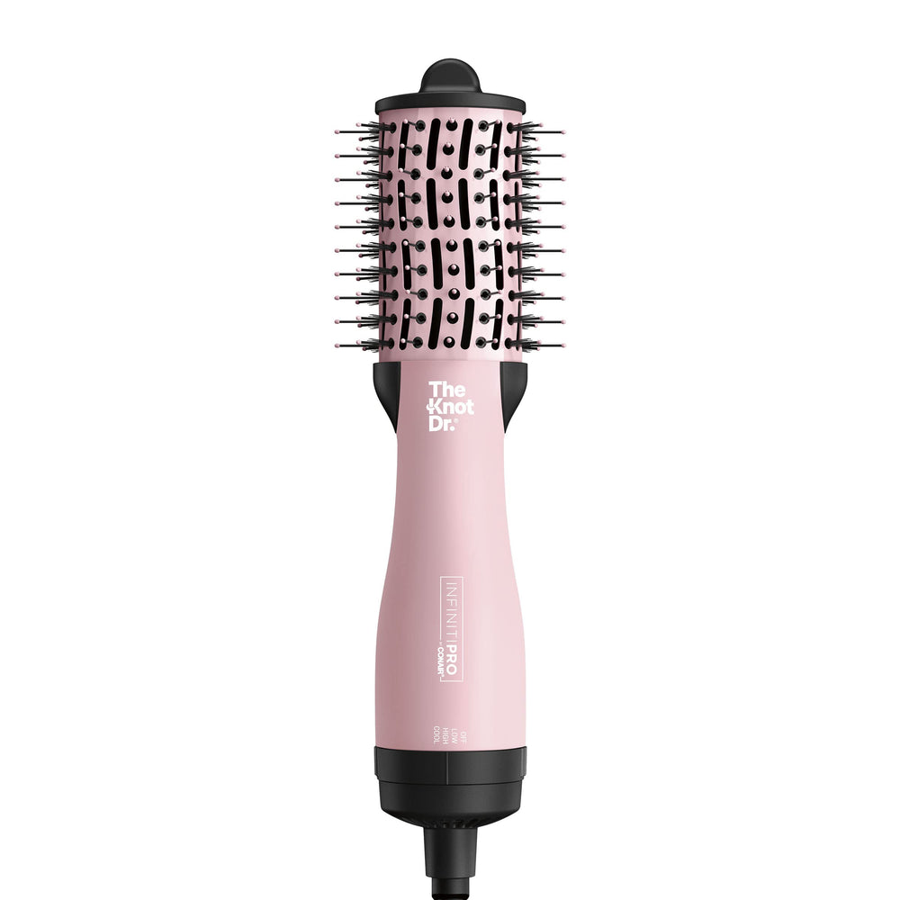 Conair Knot Dr. oval brush front view highlights travel-friendly detangling power.