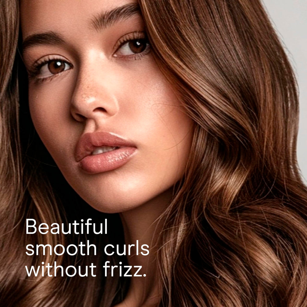 Conair Instant Heat curling iron 5-foot cord for easy at-seat maneuverability.