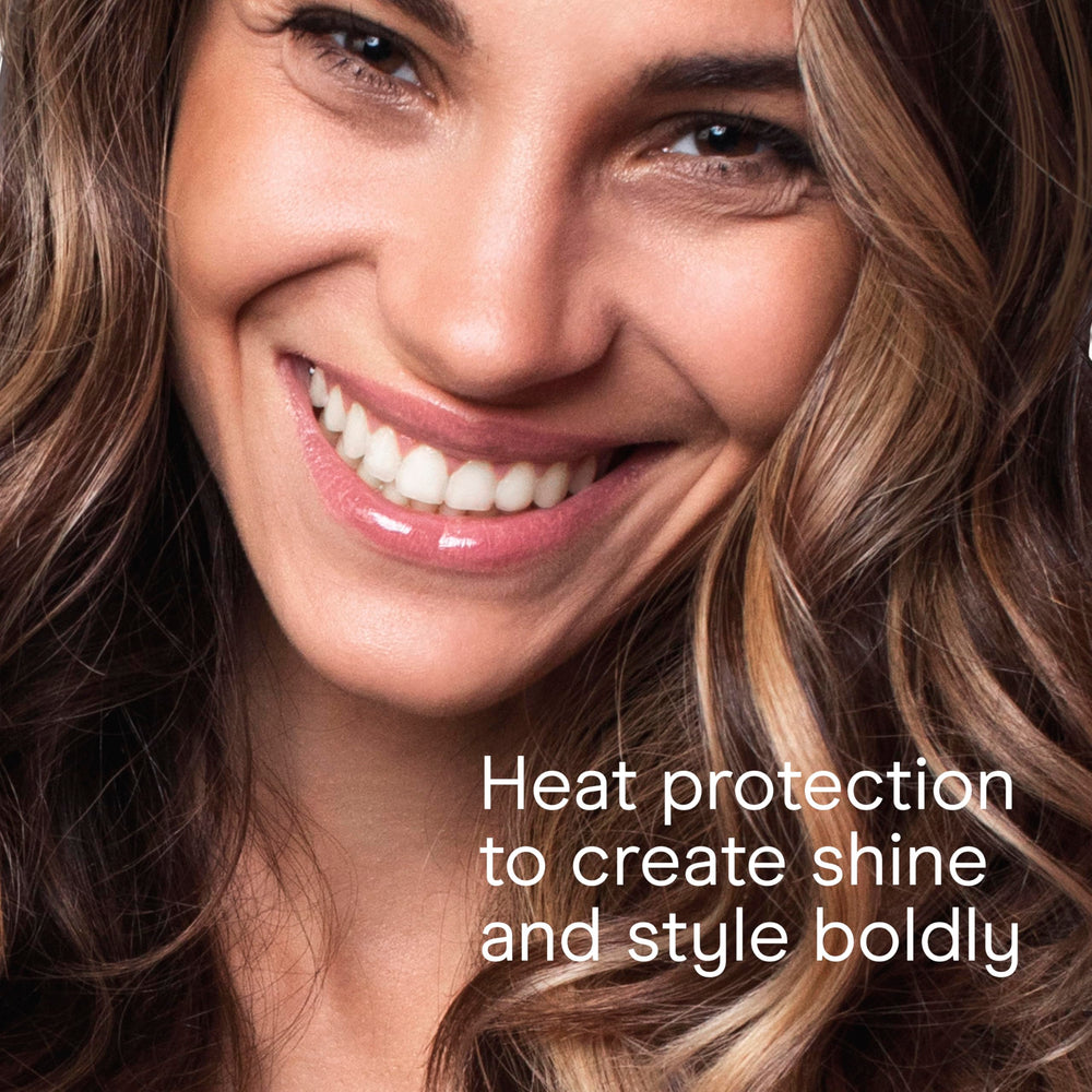 Long-hair styling demo with lasting curls.